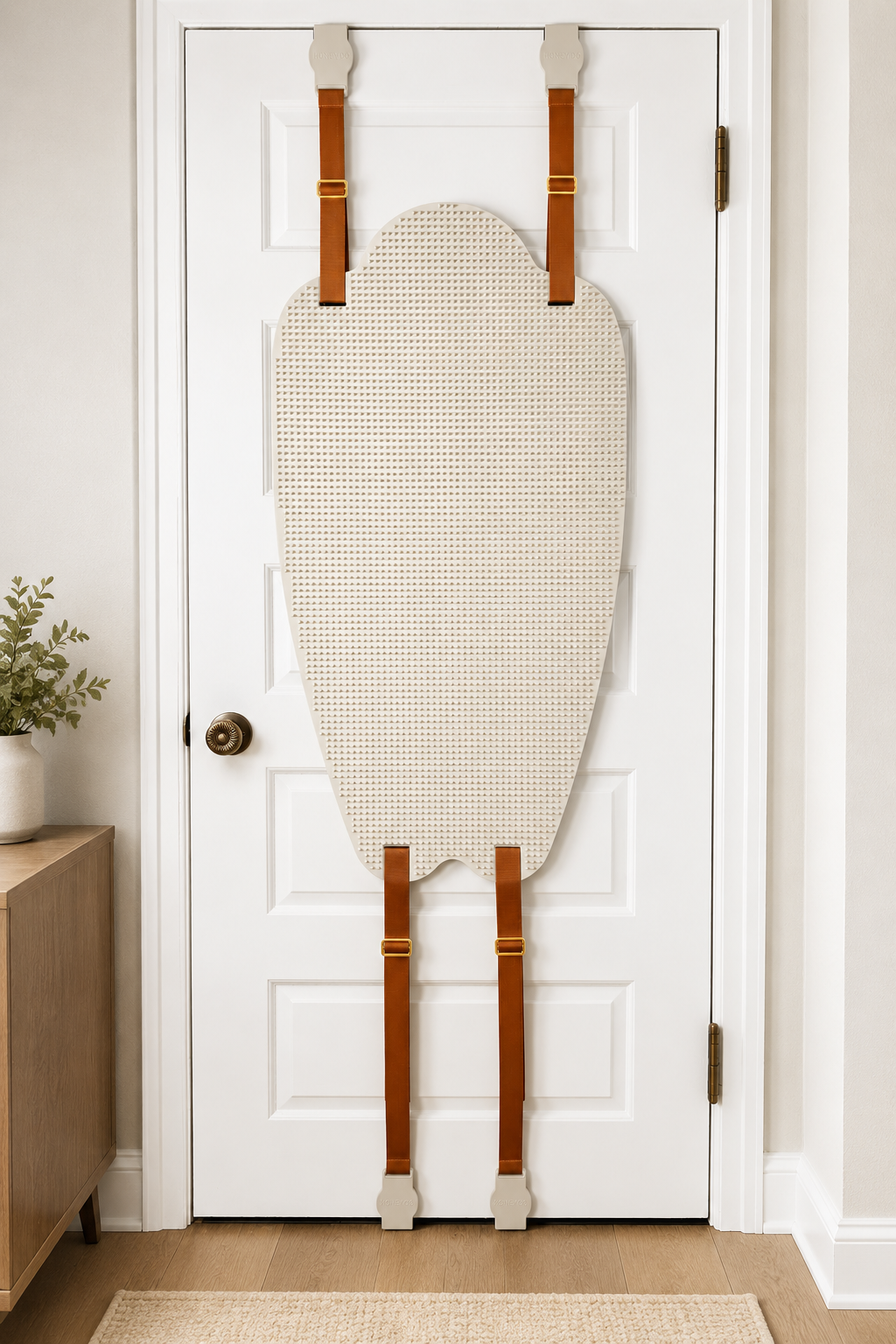 The honey do backscratcher hanging on a bathroom door. Medium 65A, Firm 80A
