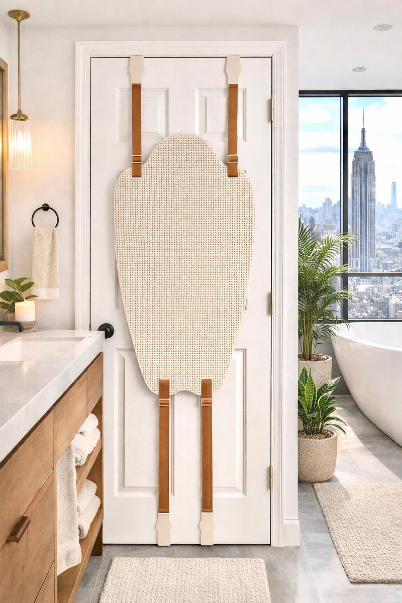 Hands free back scratcher mounted over a bathroom door for full body itch relief