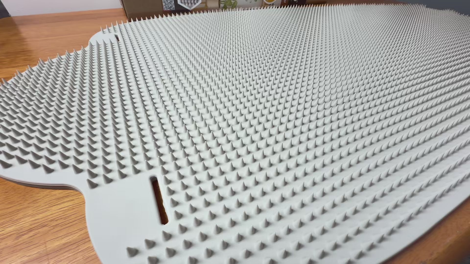 The Honey Do hands-free back scratcher mounted on door showing 4500 silicone bristles close-up